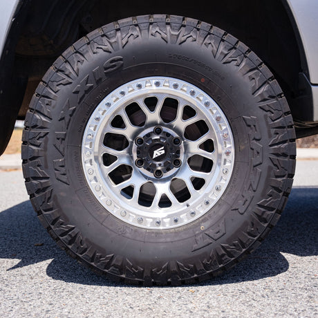 Close-up of a tire with a alloy rim on a vehicle
